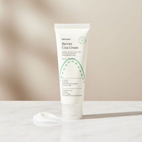 dercent-barrier-cica-cream-on-marble-surface-moisturizer Dercent Barrier Cica Cream tube and box placed on a white marble surface under soft natural light, showcasing a Korean skin barrier repair moisturizer.