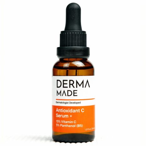 Derma Made Antioxidant C Serum + with Vitamin C and B5 Derma Made Antioxidant C Serum + bottle containing 15% Vitamin C and 5% Panthenol (B5) on a white background