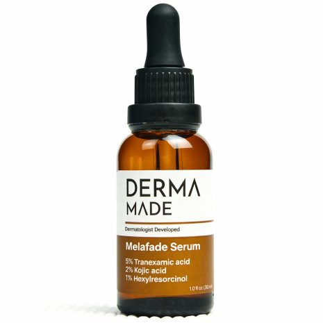 Derma Made Melafade Serum – Dark Spot Corrector for Melasma and Hyperpigmentation Derma Made Melafade Serum bottle with white and magenta label, formulated with Tranexamic Acid, Kojic Acid, and Hexylresorcinol to fade dark spots and melasma.
