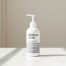 Derma Made Niacinamide Lotion bottle displayed on a clean white marble surface, highlighting its calming and hydrating 2% niacinamide formula.